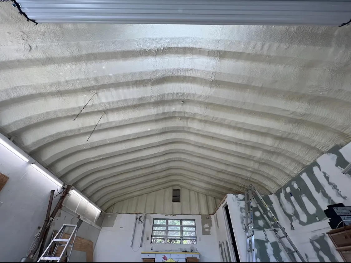 Spray polyurethane foam applied to the underside of a metal roof deck in Upper Gwynedd
